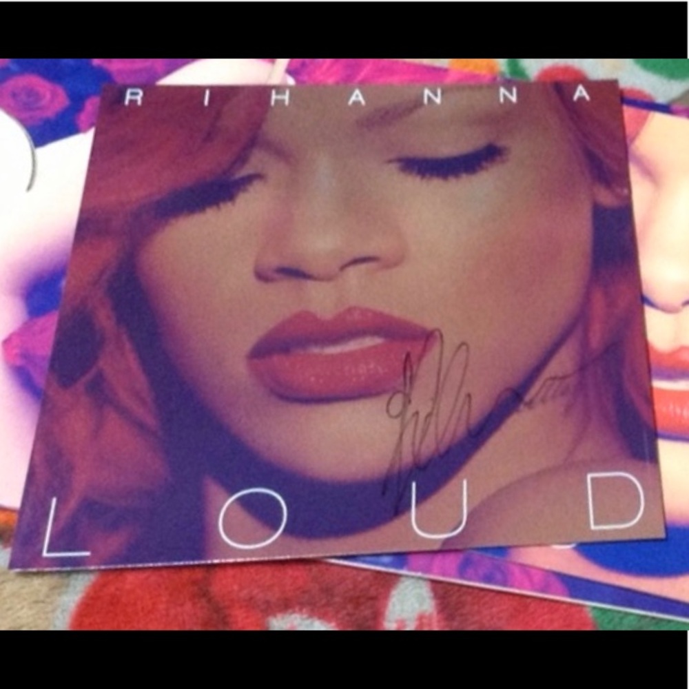 Rihanna’s autograph (authentic) poster